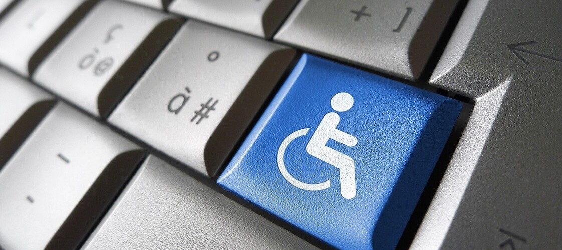 Keyboard with "disability" icon on button