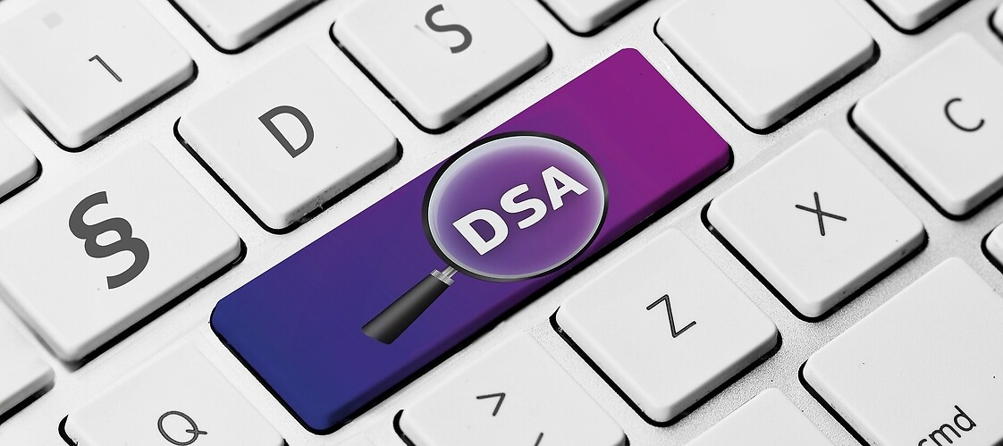 Computer keyboard with a key bearing the DSA logo